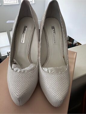 BCBGeneration White Snakeskin-Textured Pointed Toe Platform Pumps
